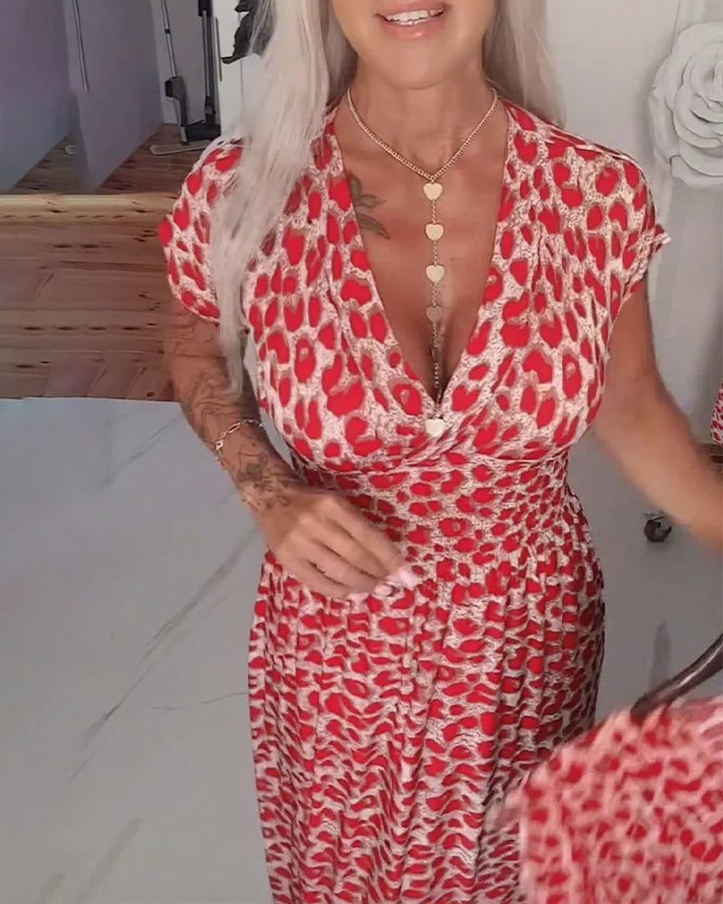 Erendira – Elegancka Sukienka z Dekoltem w Szpic i Nadrukiem w Panterkę